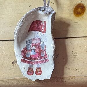 Festive Holiday Ornament with Red Santa Design